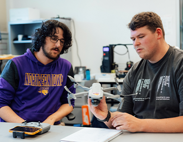 computer science students using a drone
