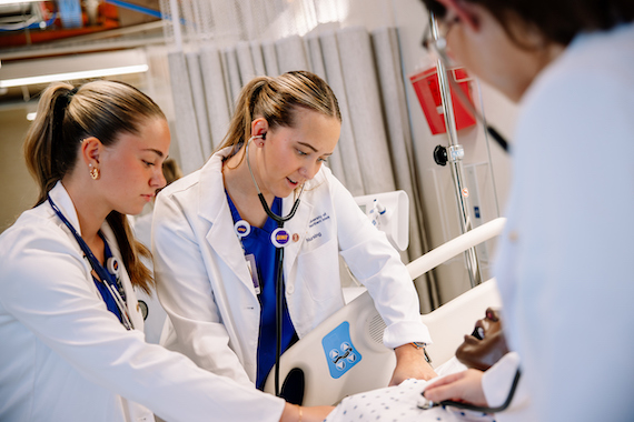 Nursing student working on a dummy