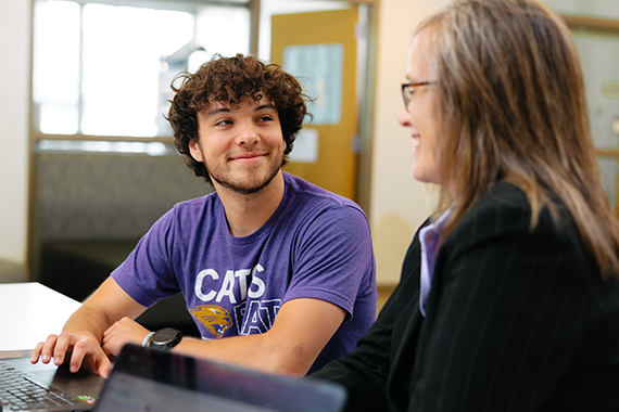Business professor mentoring a student at the University of Northern Iowa