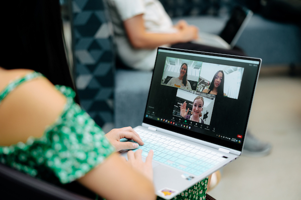 Close up of a Zoom meeting on a laptop