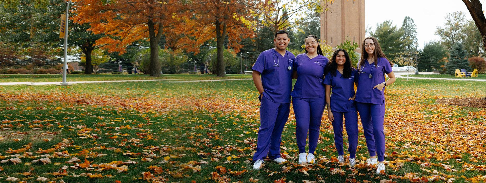 health students in front of the campanile at the University of Northern Iowa