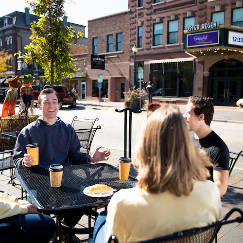 UNI students at a coffee shop on Main Street